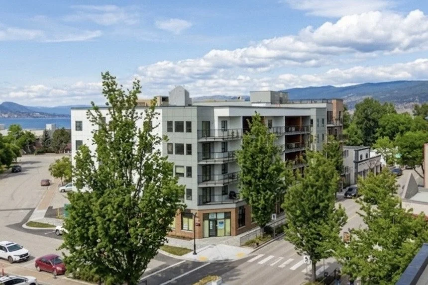 Astra Downtown on Front Street in downtown Penticton, with Okanagan Lake and the hills behind